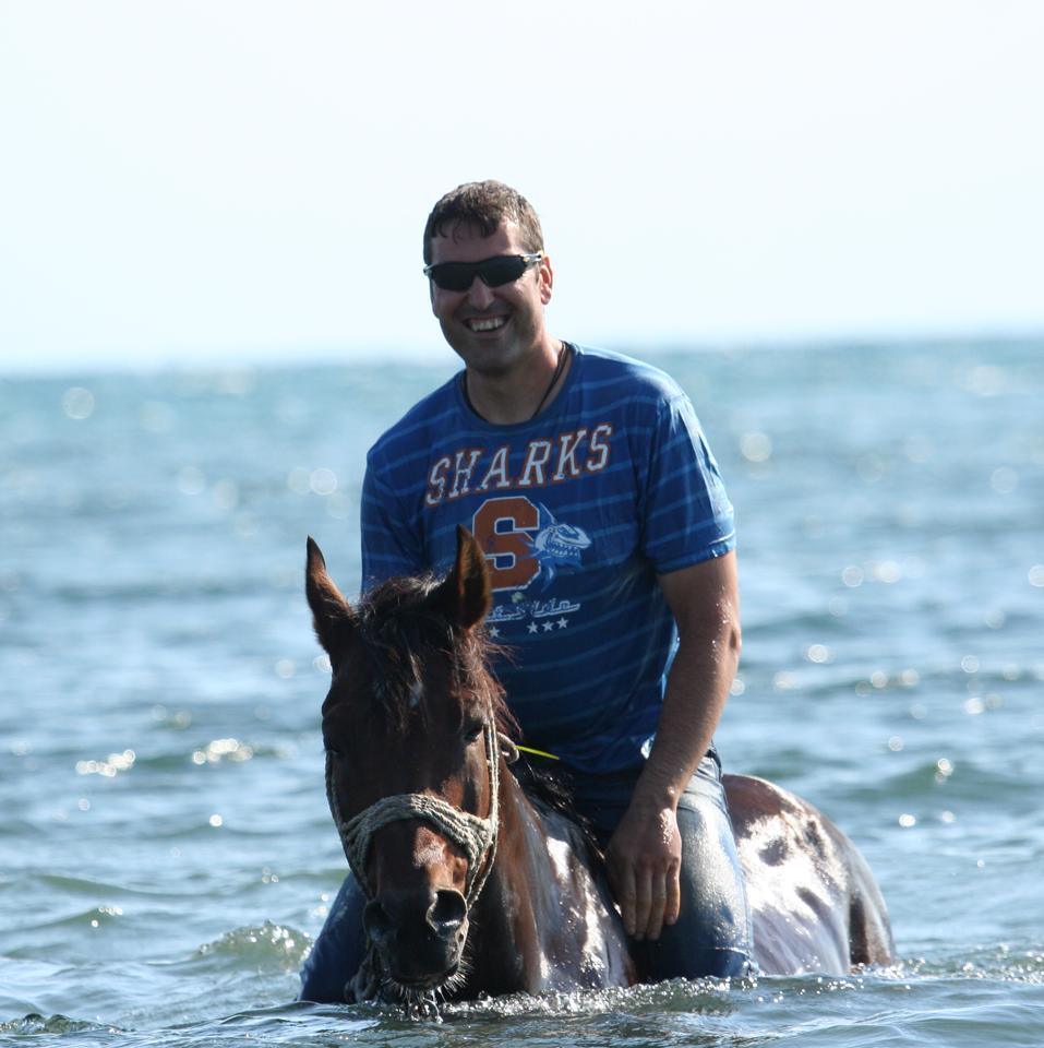 savvs panavoglou and his horse in the sea
